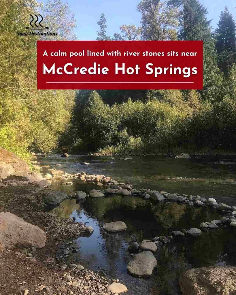 2 compressed - soakdestinations A calm pool lined with river stones sits near the flowing water at McCredie Hot Springs.