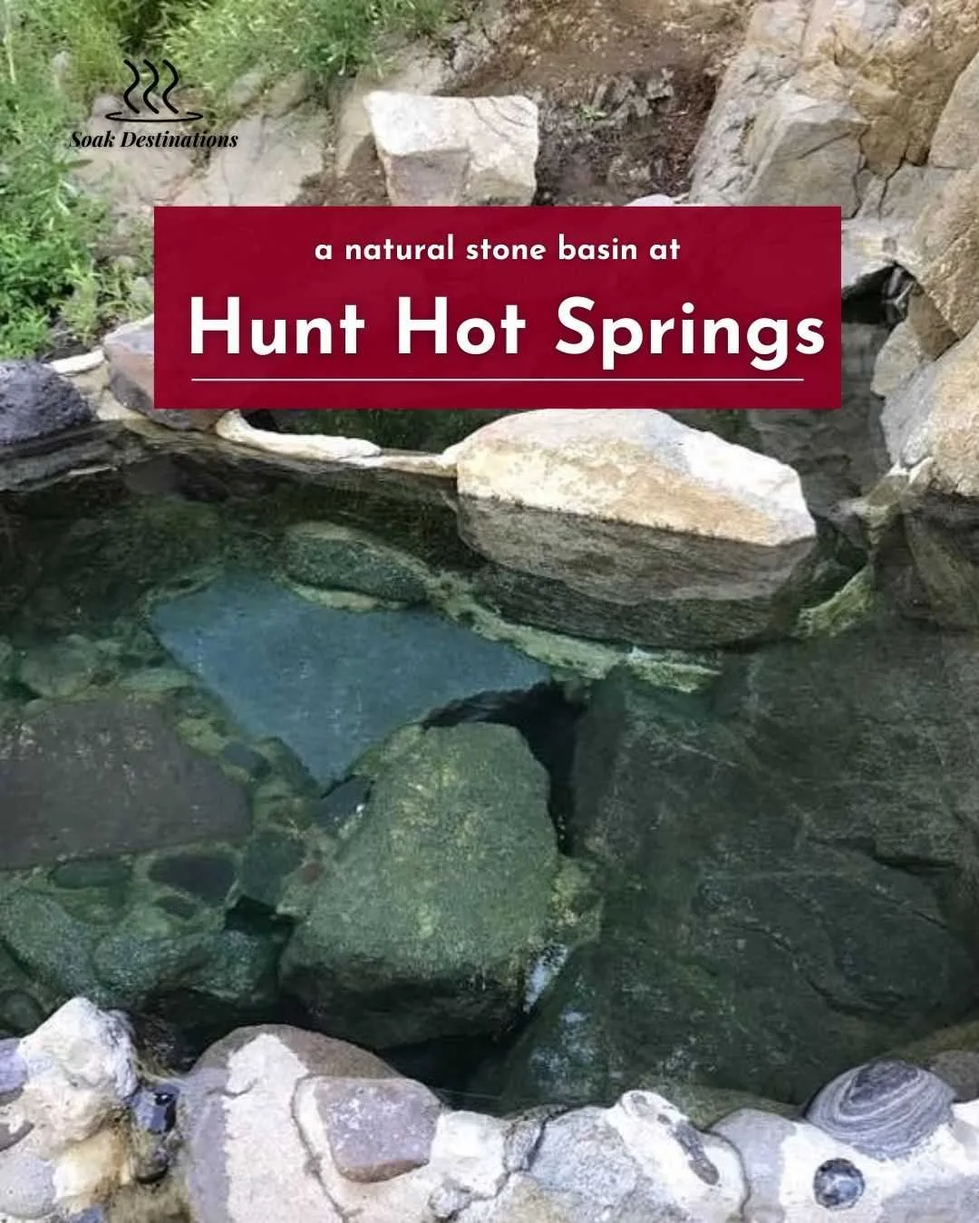 Crystal clear water rests within a natural stone basin at the peaceful Hunt Hot Springs destination.