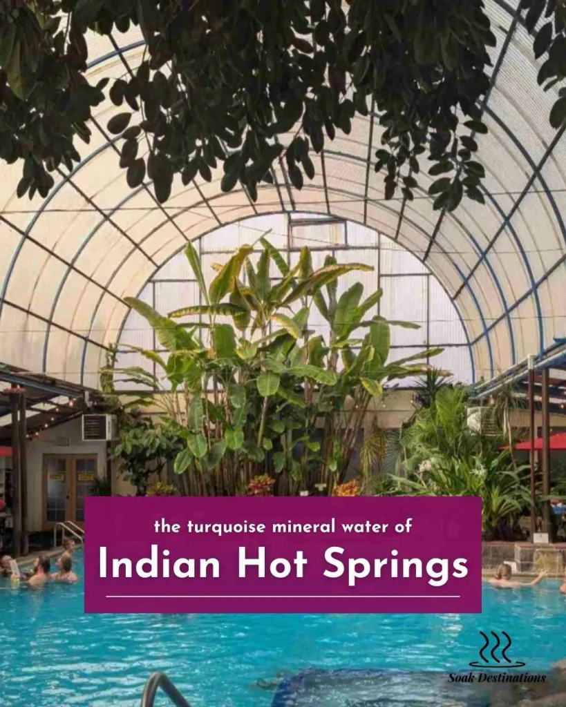 Visitors soak in the turquoise mineral water of the tropical swimming pool at Indian Hot Springs.