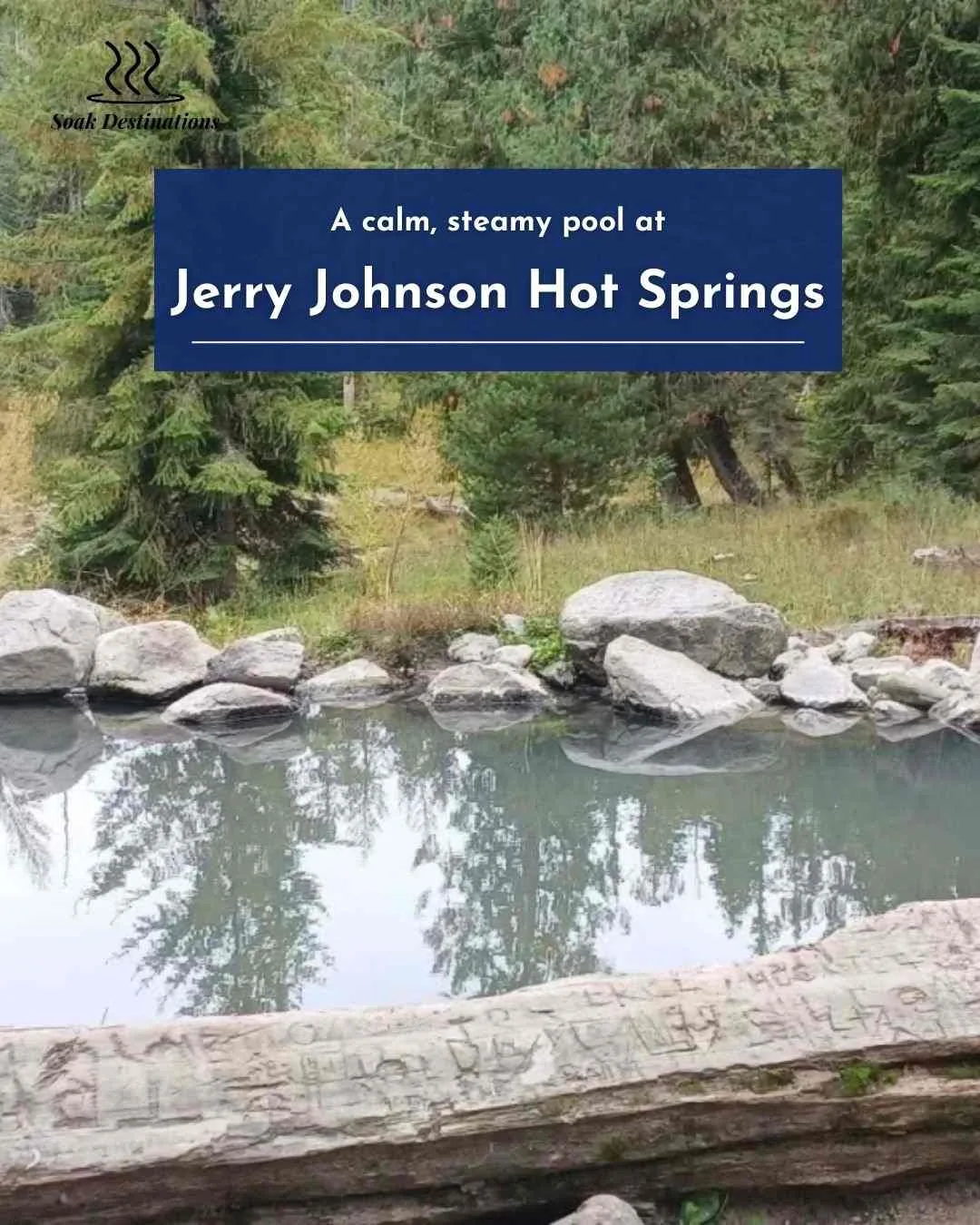 Jerry Johnson Hot Springs 6 - soakdestinations A calm, steamy pool sits among rocks and tall evergreen trees at Jerry Johnson Hot Springs.