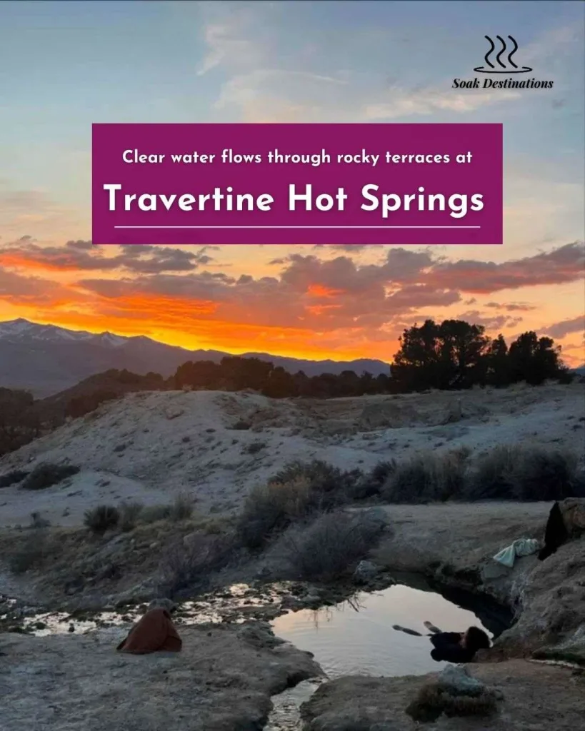 Clear water flows through rocky terraces at Travertine Hot Springs under a bright, cloudy sky.
