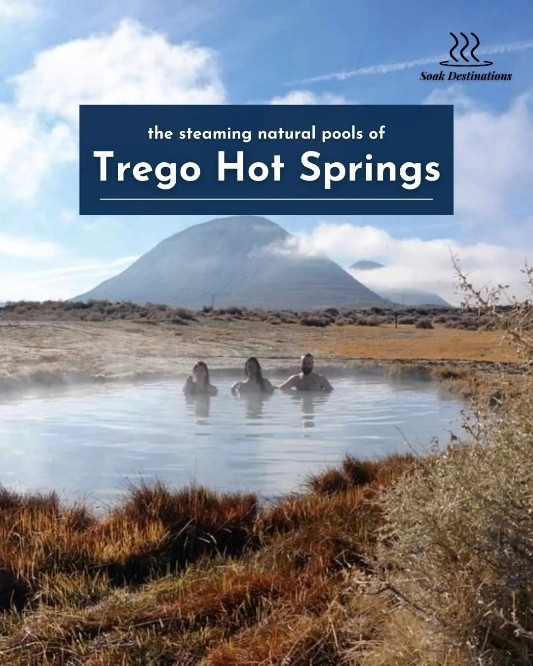 Three people enjoy a relaxing soak in the steaming natural pools of Trego Hot Springs.