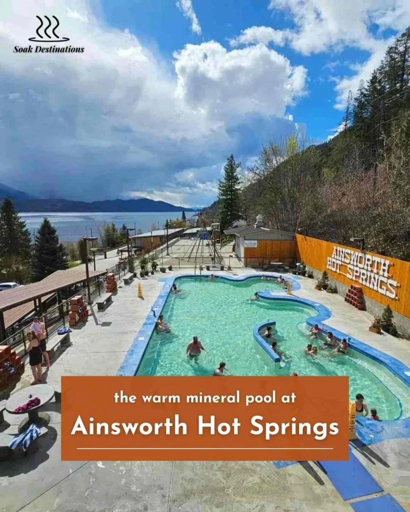 Ainsworth Hot Springs 10 - soakdestinations Guests enjoying the warm mineral pool at Ainsworth Hot Springs Resort with breathtaking lake and mountain views.