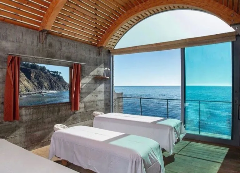 Oceanview spa room with massage tables at Esalen Hot Springs.