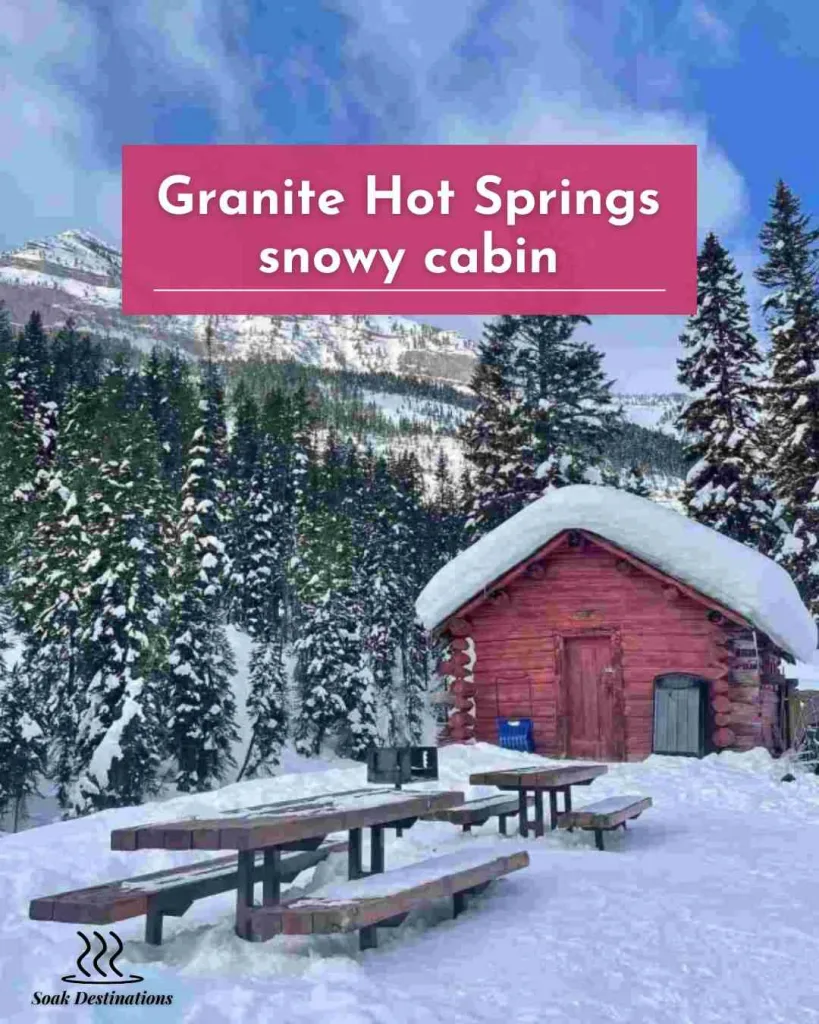 Granite Hot Springs 6 - soakdestinations Granite Hot Springs snowy cabin with mountain and pine forest.