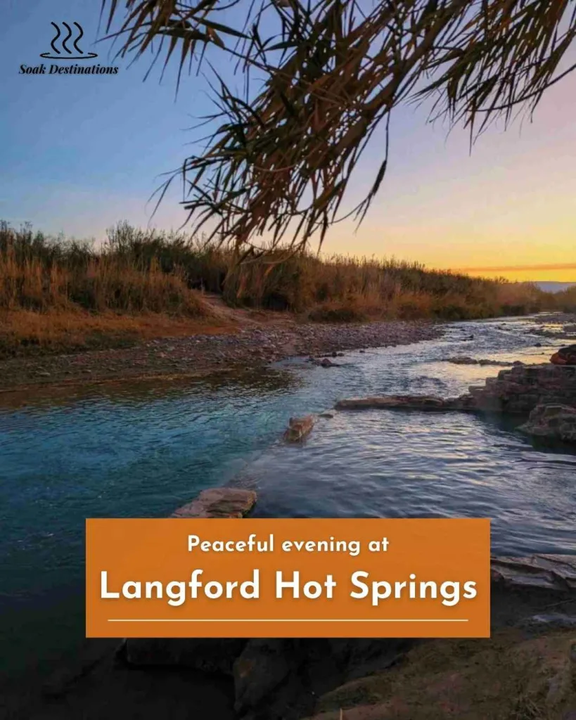 Peaceful evening at Langford Hot Springs with warm waters, golden sunset, and tranquil desert scenery.
