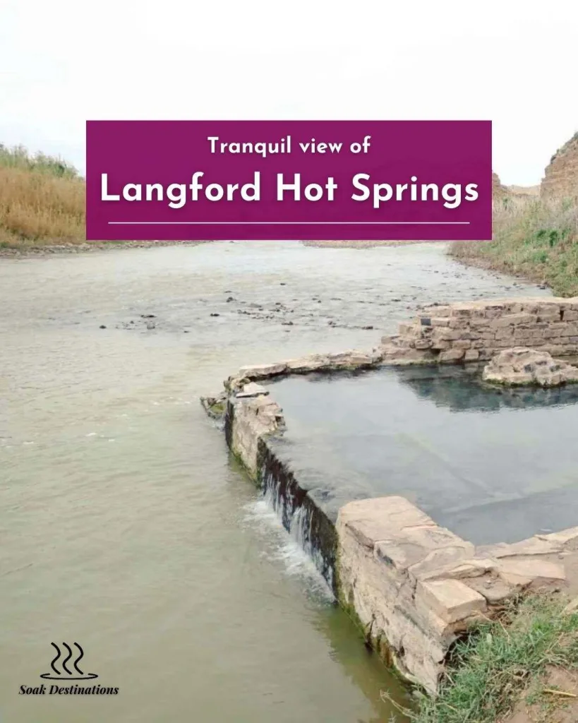 Tranquil view of Langford Hot Springs beside the Rio Grande, surrounded by desert hills and nature.