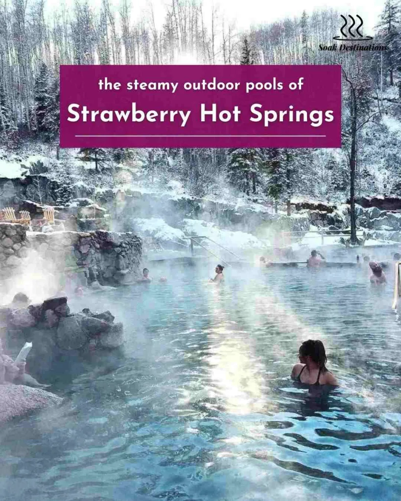 People relaxing in the steamy outdoor pools of Strawberry Hot Springs, surrounded by snow-covered trees and a bright winter sun.