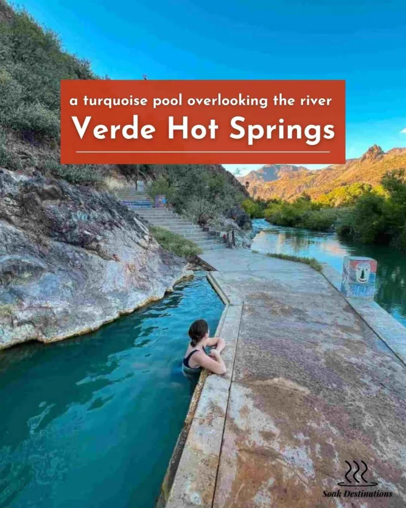 A woman relaxes in a turquoise pool overlooking the river at the scenic Verde Hot Springs.
