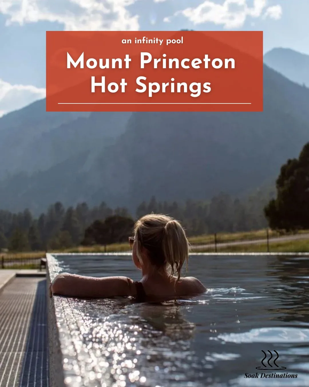 A woman relaxes in an infinity pool overlooking the mountains at Mount Princeton Hot Springs Resort.