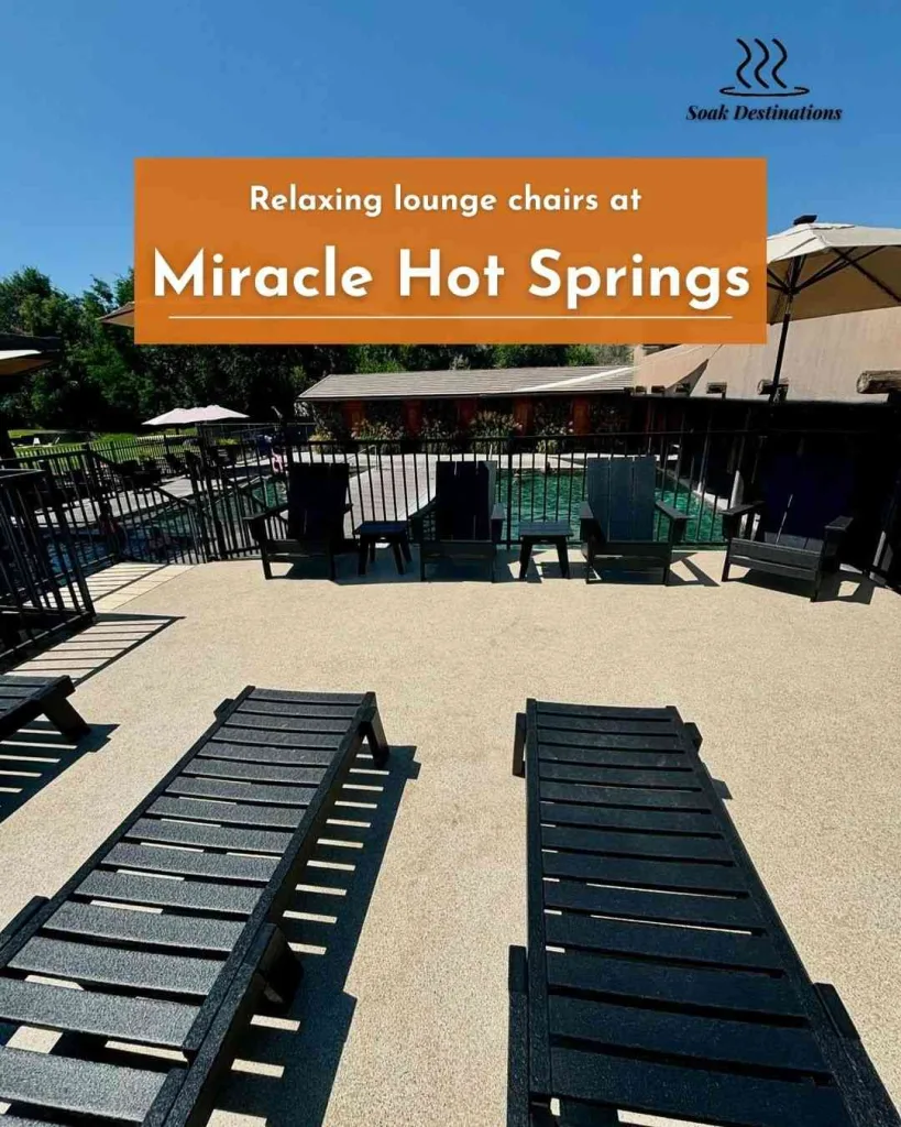 Relaxing lounge chairs at Miracle Hot Springs, offering a perfect spot to unwind under the sun. 